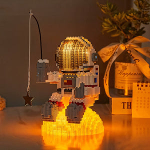 Astronaut sitting on the sun with light — Aetheron series from LumiBlocks
